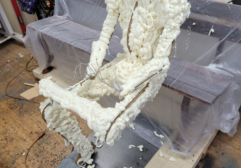 Expanding foam is a great option for sculpting; minus the curing time.